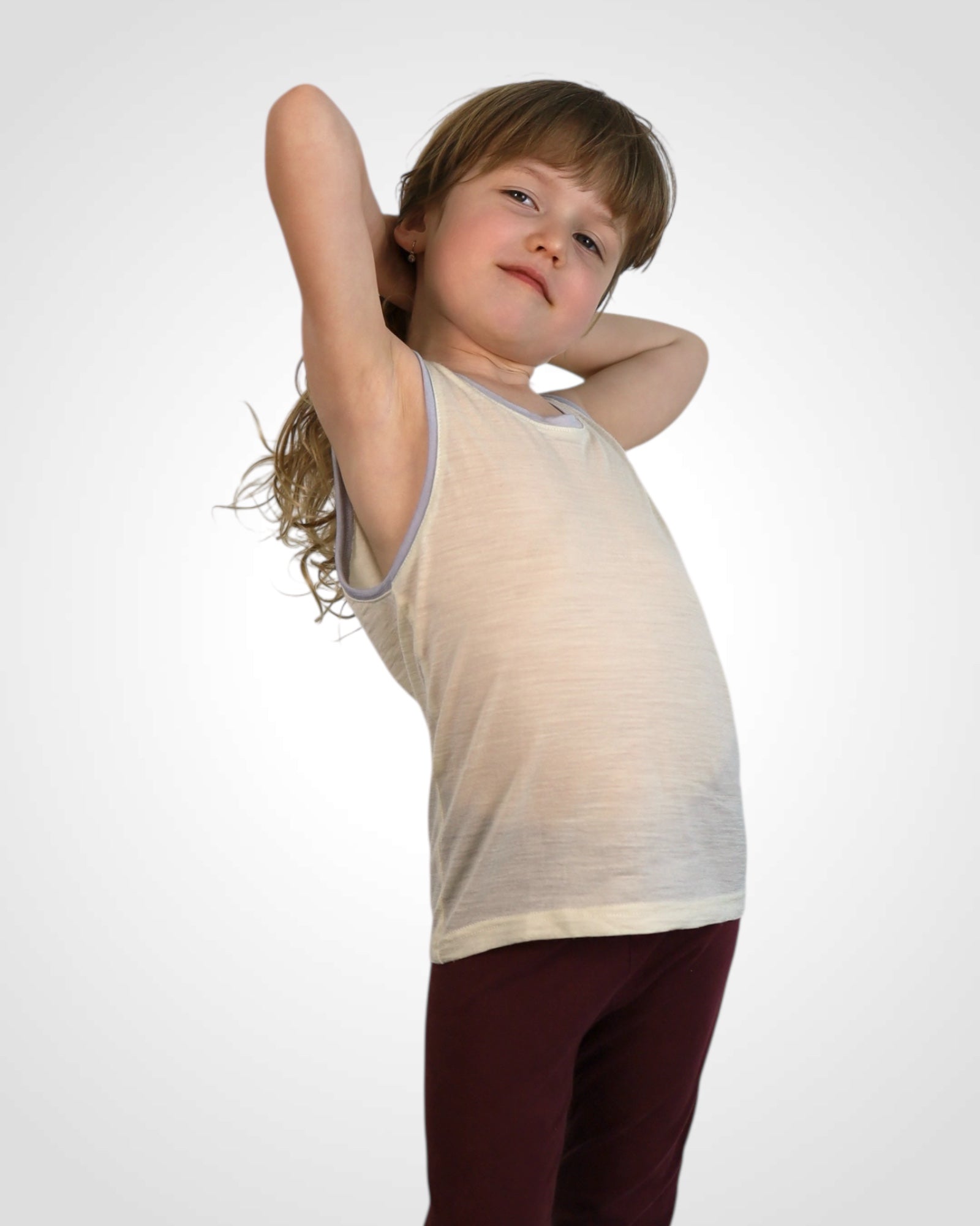 Detské tielko z nefarbenej merino vlny s výberom farebných lemov – šetrné k citlivej pokožke.